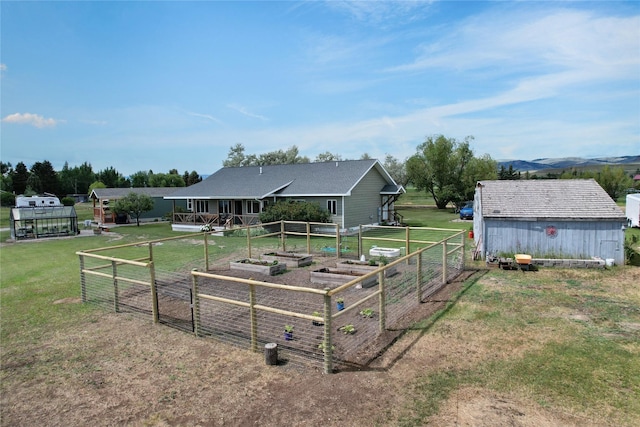 2 Hardy Cir, Ennis, MT 59729 - exterior space with a vegetable garden and a shed