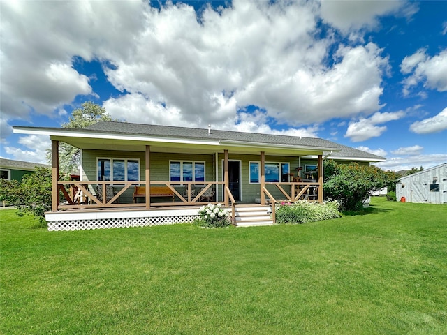 2 Hardy Cir, Ennis, MT 59729 - back of house with covered porch and a lawn