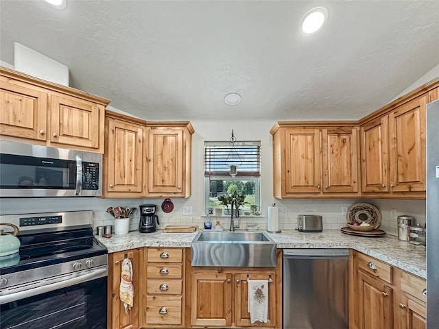 2 Hardy Cir, Ennis, MT 59729 - kitchen with stainless steel appliances and recessed lighting