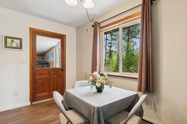 257 Fawn Trl, Whitefish, MT 59937 - dining area with healthy amount of natural light and wood finished floors