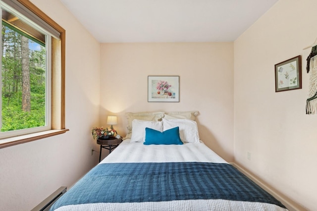 257 Fawn Trl, Whitefish, MT 59937 - bedroom featuring a baseboard heating unit and baseboards