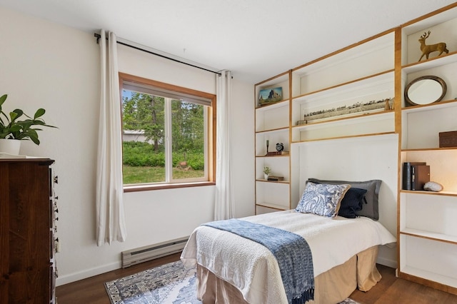 257 Fawn Trl, Whitefish, MT 59937 - bedroom featuring a baseboard radiator and wood finished floors