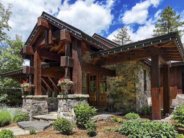 1263 Spencer Ridge Rd, Whitefish, MT 59937 - back of property with stone siding and french doors