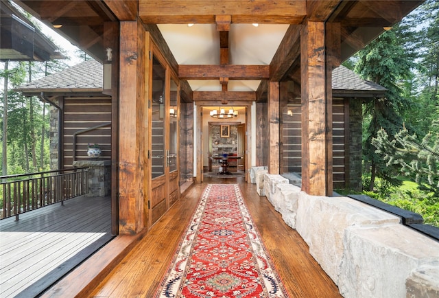 1263 Spencer Ridge Rd, Whitefish, MT 59937 - corridor with a chandelier