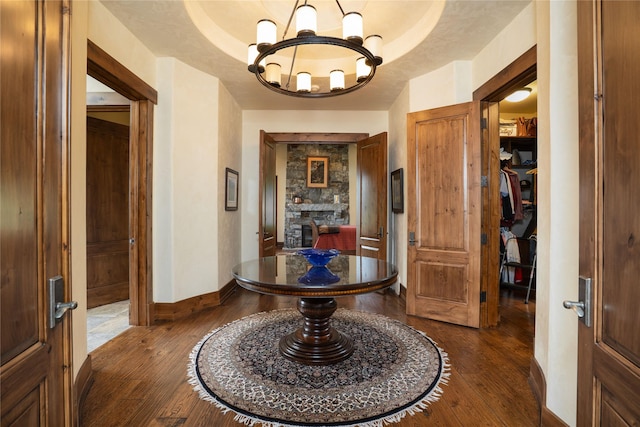1263 Spencer Ridge Rd, Whitefish, MT 59937 - hallway featuring dark wood finished floors and a chandelier