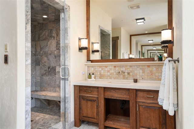 1263 Spencer Ridge Rd, Whitefish, MT 59937 - bathroom with backsplash, a shower stall, and vanity