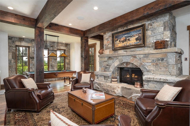 1263 Spencer Ridge Rd, Whitefish, MT 59937 - living area featuring wood finished floors, billiards, beam ceiling, a fireplace, and recessed lighting