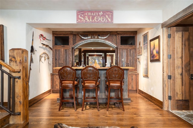 1263 Spencer Ridge Rd, Whitefish, MT 59937 - indoor dry bar with wood finished floors and stairway