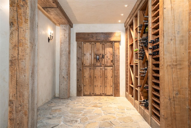 1263 Spencer Ridge Rd, Whitefish, MT 59937 - wine area featuring stone flooring and recessed lighting