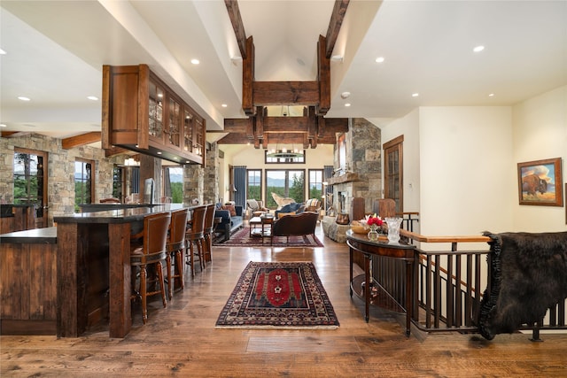 1263 Spencer Ridge Rd, Whitefish, MT 59937 - indoor bar with wood finished floors, recessed lighting, beam ceiling, and high vaulted ceiling
