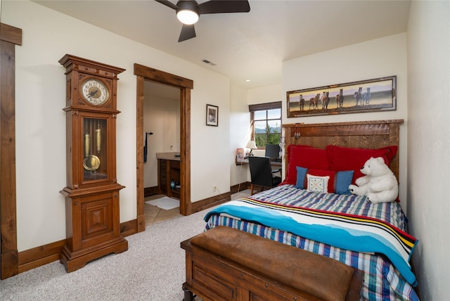 1263 Spencer Ridge Rd, Whitefish, MT 59937 - bedroom with carpet floors, a ceiling fan, and connected bathroom