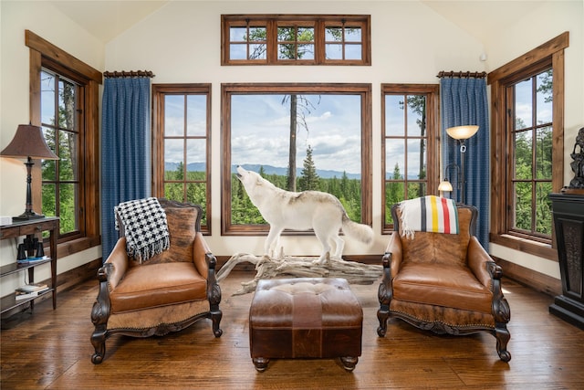 1263 Spencer Ridge Rd, Whitefish, MT 59937 - living area with hardwood / wood-style floors, healthy amount of natural light, a mountain view, and high vaulted ceiling
