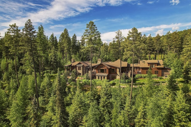 1263 Spencer Ridge Rd, Whitefish, MT 59937 - aerial view of property and surrounding area with a heavily wooded area