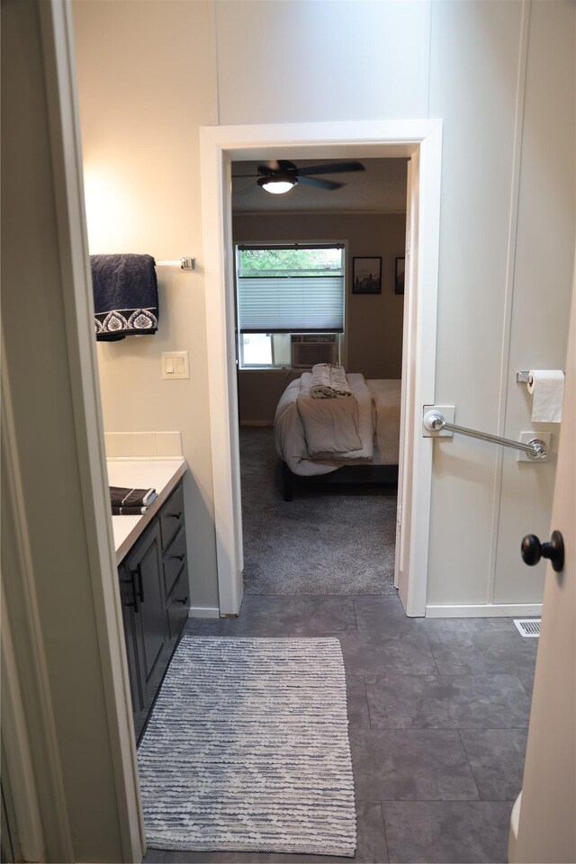 3000 Villard Ave Unit 149, Helena, MT 59601 - bathroom with vanity, a ceiling fan, and cooling unit