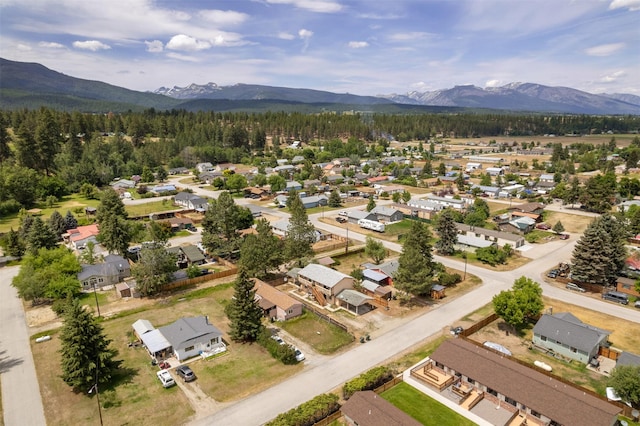 105 S Clifton St, Darby, MT 59829 - aerial perspective of suburban area featuring a mountainous background