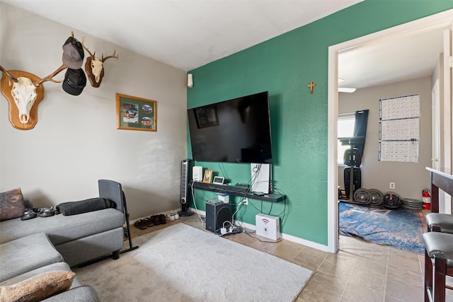 105 S Clifton St, Darby, MT 59829 - living area featuring tile patterned floors and baseboards