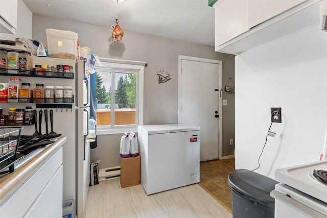 105 S Clifton St, Darby, MT 59829 - washroom featuring baseboard heating