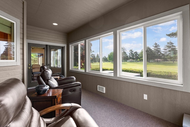 18 Buffalo Hill Cir, Kalispell, MT 59901 - sunroom / solarium with carpet, wood walls, and recessed lighting