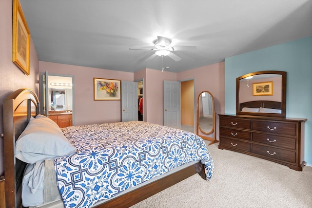 18 Buffalo Hill Cir, Kalispell, MT 59901 - bedroom with carpet, ensuite bathroom, a ceiling fan, and a closet