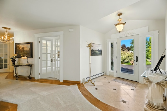 12 Pathfinder Trl, Bozeman, MT 59718 - foyer entrance featuring a baseboard radiator, a chandelier, french doors, and lofted ceiling