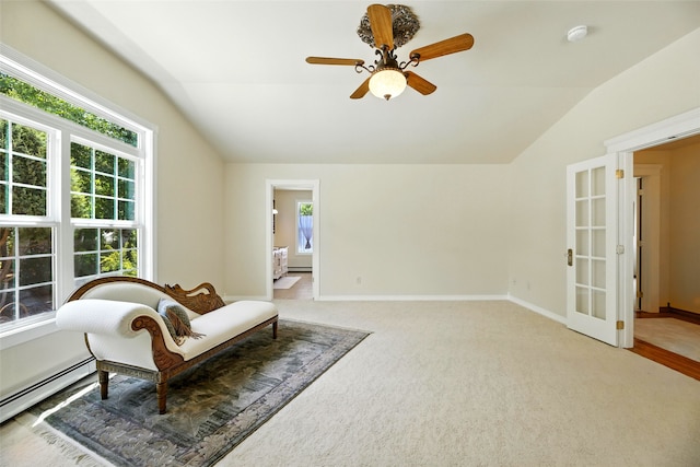12 Pathfinder Trl, Bozeman, MT 59718 - living area featuring vaulted ceiling, ceiling fan, french doors, a baseboard radiator, and light carpet