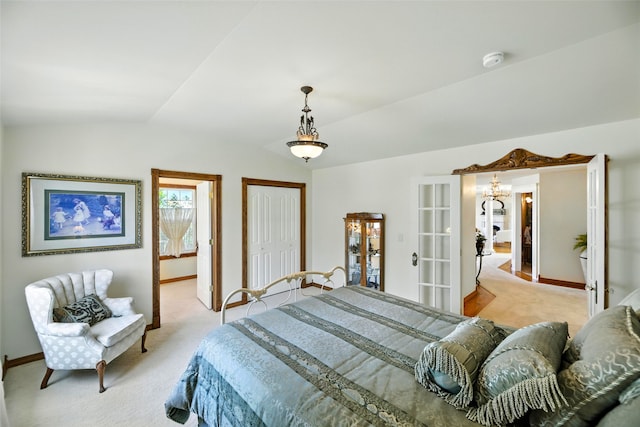 12 Pathfinder Trl, Bozeman, MT 59718 - bedroom with lofted ceiling, french doors, light colored carpet, and a closet