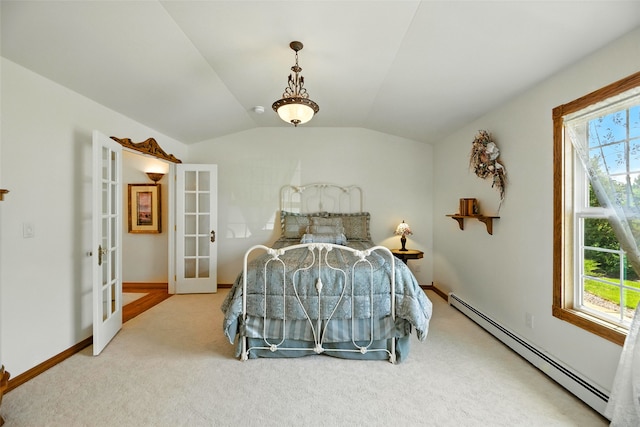 12 Pathfinder Trl, Bozeman, MT 59718 - carpeted bedroom featuring baseboard heating, french doors, and lofted ceiling