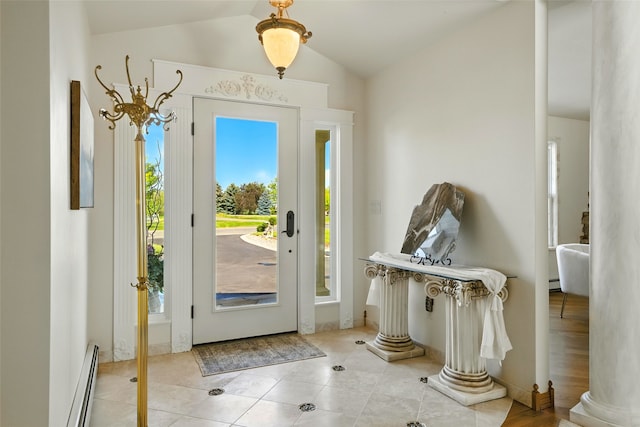12 Pathfinder Trl, Bozeman, MT 59718 - tiled foyer entrance with vaulted ceiling, baseboard heating, decorative columns, and a baseboard radiator