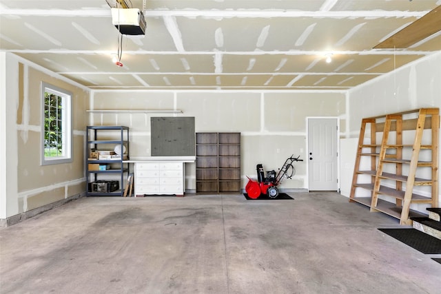 12 Pathfinder Trl, Bozeman, MT 59718 - garage featuring a garage door opener