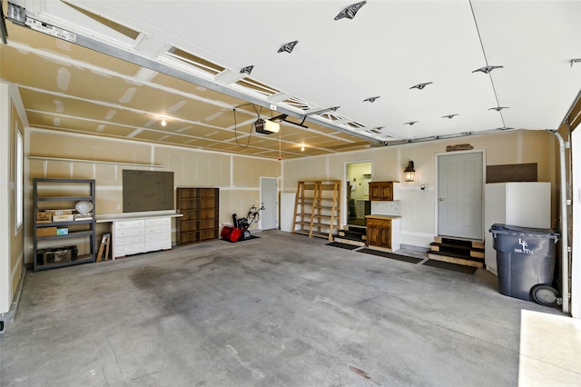 12 Pathfinder Trl, Bozeman, MT 59718 - garage featuring a garage door opener