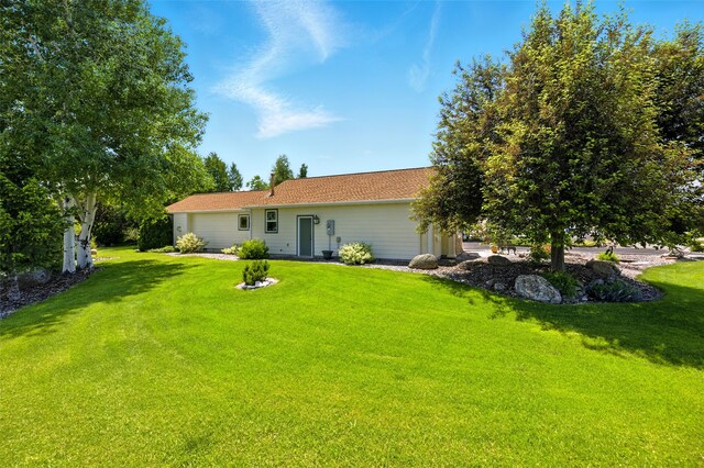 12 Pathfinder Trl, Bozeman, MT 59718 - view of green lawn with a storage shed
