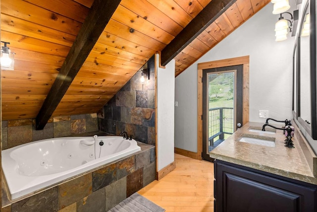 32785 Linden Ln, Bigfork, MT 59911 - bathroom featuring hardwood / wood-style floors, vanity, wooden ceiling, and a jetted tub