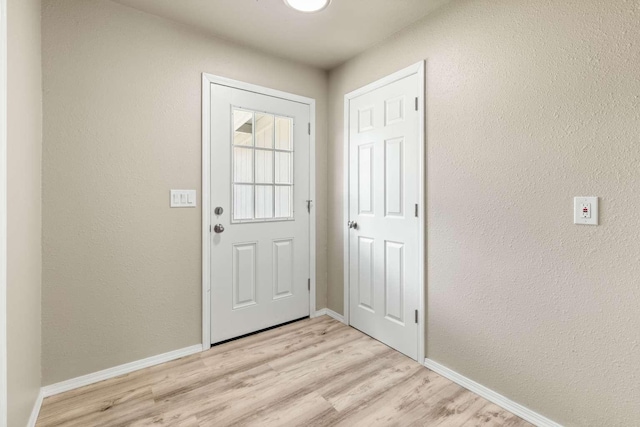 620 N 4th St, Hamilton, MT 59840 - entryway featuring light wood-style floors and a textured wall
