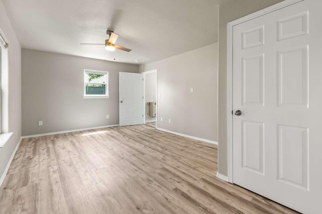620 N 4th St, Hamilton, MT 59840 - unfurnished bedroom with light wood-style flooring and a ceiling fan