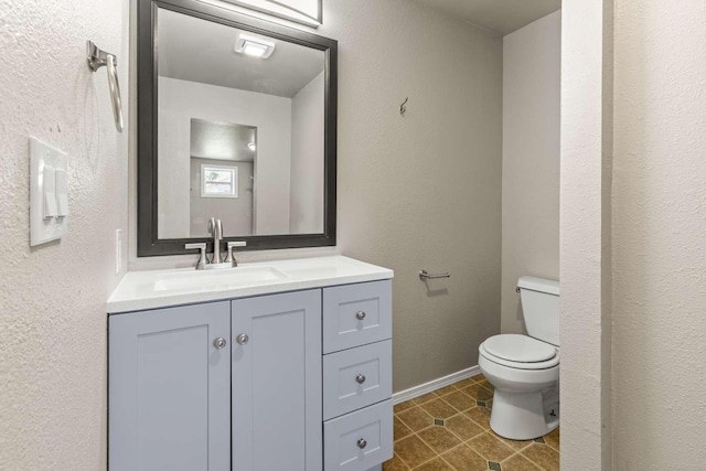 620 N 4th St, Hamilton, MT 59840 - bathroom with vanity, tile patterned flooring, and a textured wall