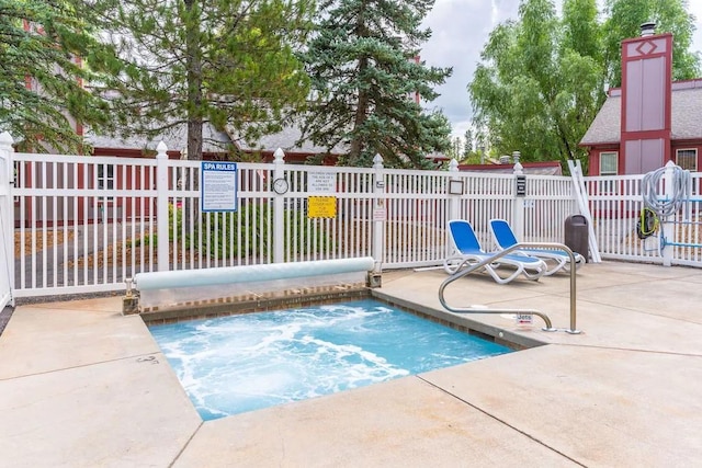 67 Crestwood Dr Unit A, Whitefish, MT 59937 - view of swimming pool with a patio area and a community hot tub