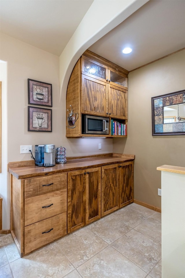 13 Crossfire Dr, Clancy, MT 59634 - kitchen with stainless steel microwave and brown cabinetry