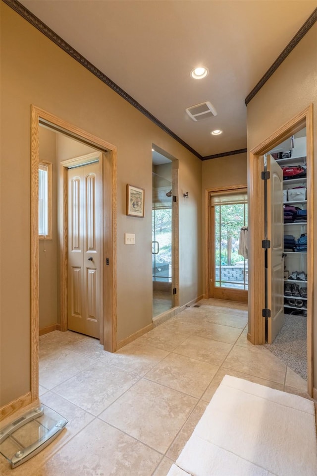 13 Crossfire Dr, Clancy, MT 59634 - corridor featuring ornamental molding, light tile patterned floors, and recessed lighting