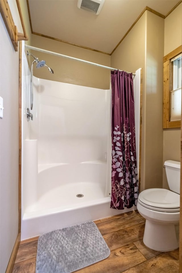 13 Crossfire Dr, Clancy, MT 59634 - bathroom with curtained shower and wood finished floors