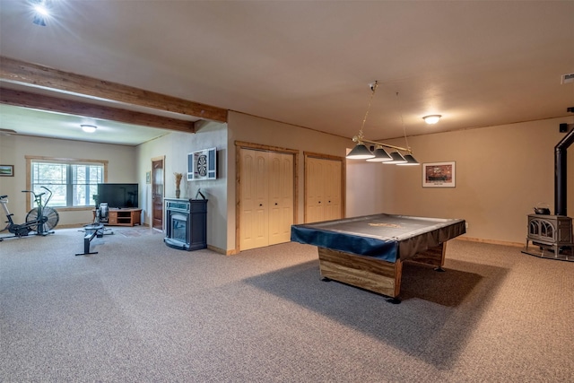 13 Crossfire Dr, Clancy, MT 59634 - game room with a wood stove, carpet flooring, billiards table, and beamed ceiling