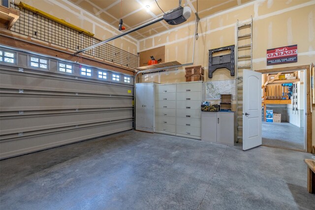 13 Crossfire Dr, Clancy, MT 59634 - garage featuring a garage door opener