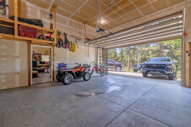 13 Crossfire Dr, Clancy, MT 59634 - garage featuring a garage door opener