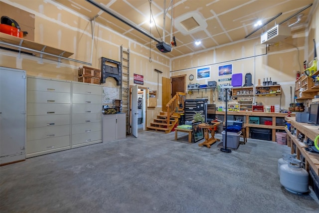 13 Crossfire Dr, Clancy, MT 59634 - garage featuring a workshop area and a garage door opener