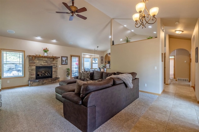 13 Crossfire Dr, Clancy, MT 59634 - living area featuring arched walkways, plenty of natural light, light carpet, a ceiling fan, and high vaulted ceiling