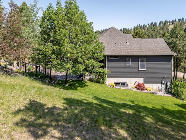 13 Crossfire Dr, Clancy, MT 59634 - rear view of property featuring a yard and roof with shingles