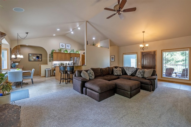 13 Crossfire Dr, Clancy, MT 59634 - living room with a chandelier, light colored carpet, light tile patterned floors, ceiling fan, and high vaulted ceiling