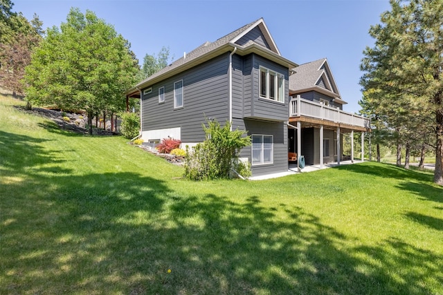 13 Crossfire Dr, Clancy, MT 59634 - rear view of house featuring a yard, a wooden deck, and a patio