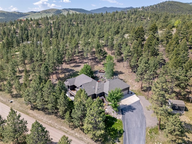 13 Crossfire Dr, Clancy, MT 59634 - aerial view of property's location featuring a mountain backdrop and a heavily wooded area