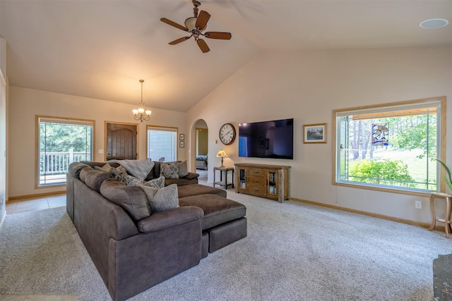 13 Crossfire Dr, Clancy, MT 59634 - living area with arched walkways, ceiling fan, healthy amount of natural light, light colored carpet, and high vaulted ceiling