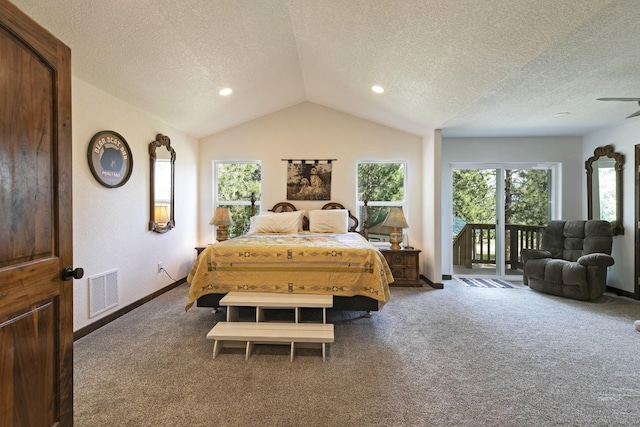 3979 Evenson Ln, Stevensville, MT 59870 - carpeted bedroom featuring access to outside, a textured ceiling, lofted ceiling, and recessed lighting